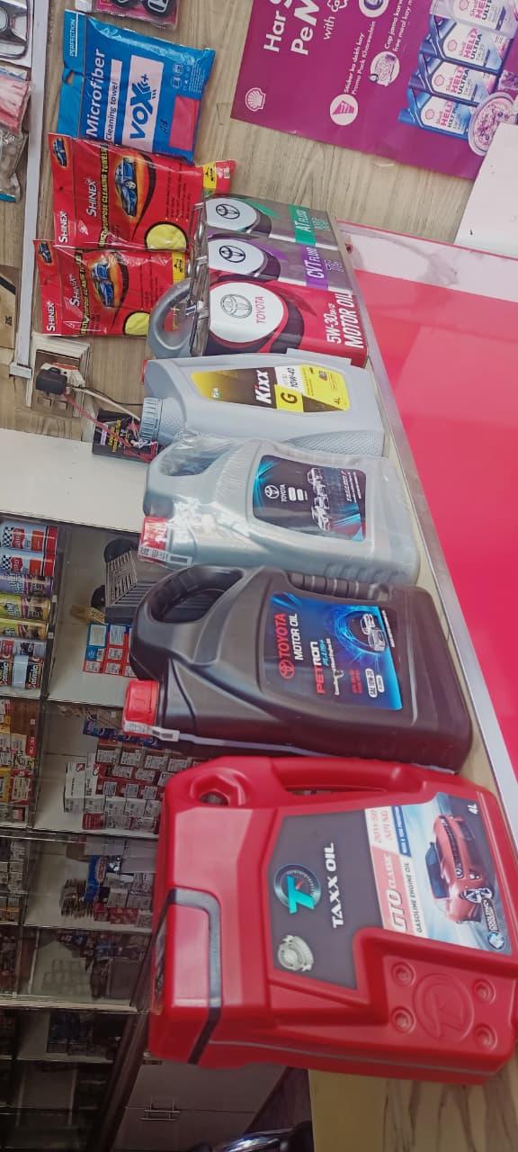 Auto spare parts shelves at Murtaza Autos store in Gojra, Pakistan